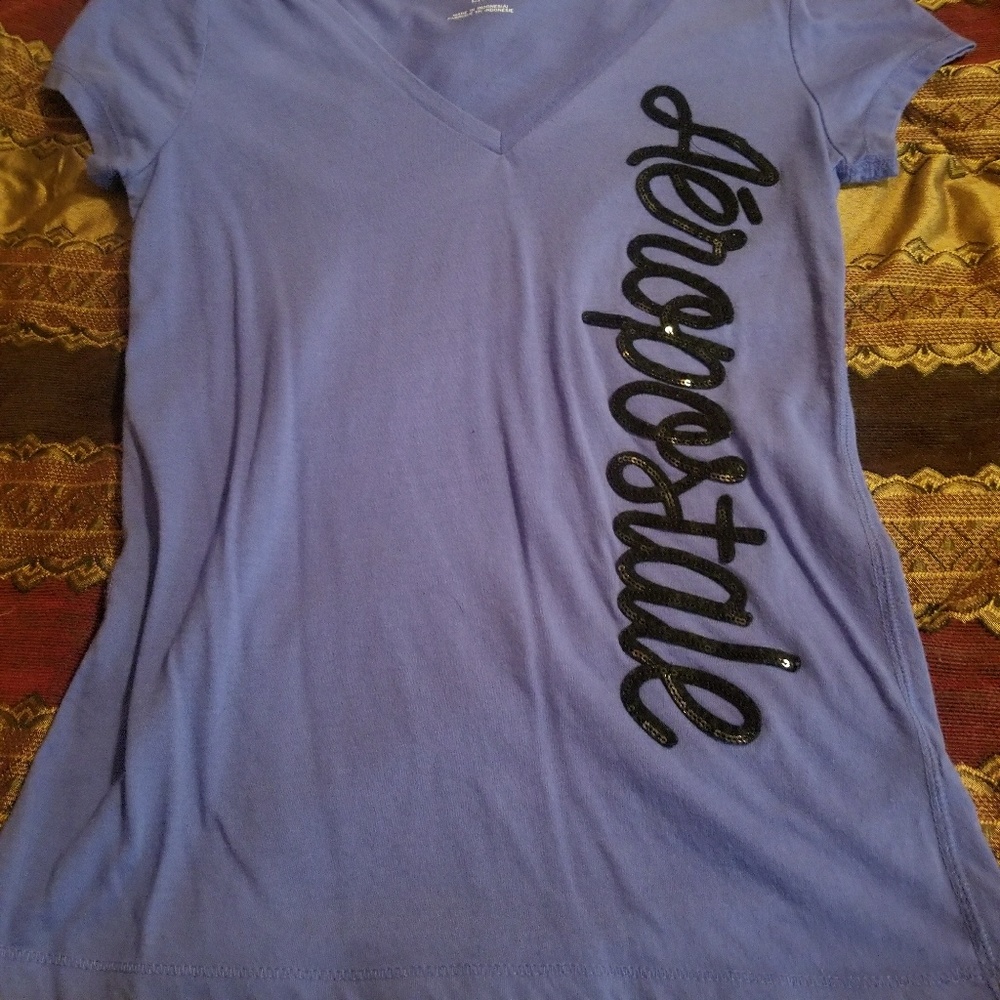 Large purple with black sequence aero tee